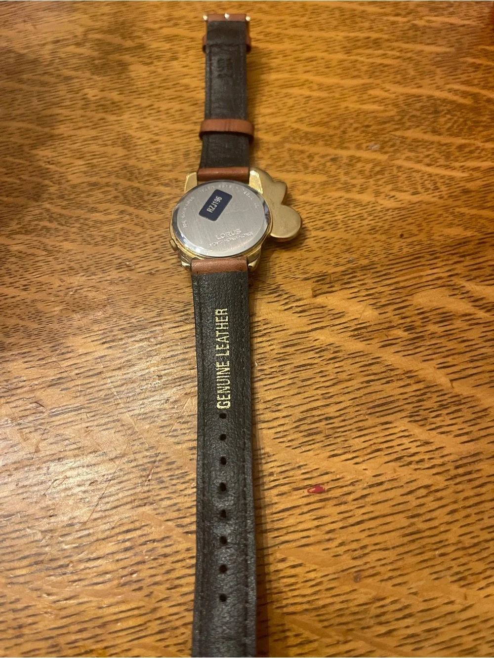 Vintage Lorus Minnie Mouse character watch featuring a distinct gold-tone Minnie